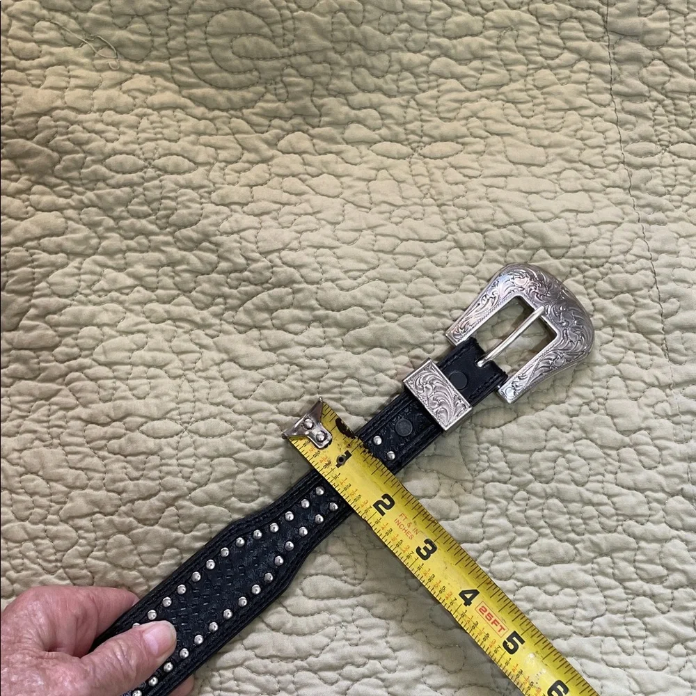 Engraved silver and studded, leather cowboy belt